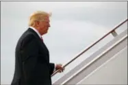  ?? THE ASSOCIATED PRESS ?? President Donald Trump boards Air Force One, Saturday, Oct. 7, 2017, in Andrews Air Force Base, Md.