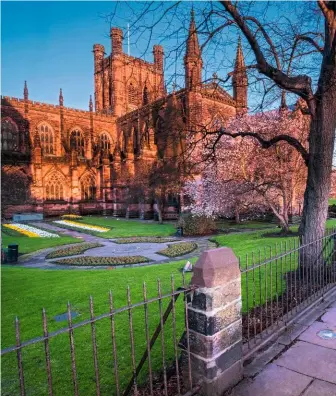  ??  ?? ON HOLY GROUND The walls also skirt the gardens of Chester Cathedral. With its red-brown sandstone walls, the cathedral looks fabulous at sunset.