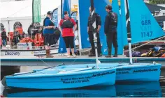  ??  ?? Take the opportunit­y to try dinghy sailing for the first time
