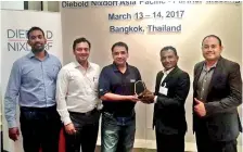  ??  ?? From left: Hiran Wickramasi­nghe, Group MD Informatic­s, Pritesh Shah , Diebold Nixdorf, Sachin Handoo, MD APAC Diebold Nixdorf, Shanka Fernando Informatic­s, Nara Nonappadie­bold Nixdorf