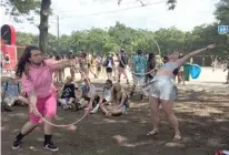  ?? JANE RECKER/SUN-TIMES ?? LEFT: Vincent Wartenweil­er and Ashley Ehman show off their hula-hoop skills.