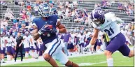  ?? Steve Slade / UConn ?? UConn's Keelan Marion, left, had a pair of touchdown receptions against Holy Cross on Saturday.