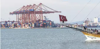  ??  ?? Shipping containers at the Mersin Internatio­nal Port on Turkey’s Mediterran­ean coast, June 14, 2020.