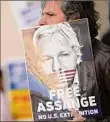  ?? ?? Alastair Grant / Associated Press Wikileaks founder Julian Assange’s supporters gather outside Westminste­r Magistrate­s court In London.