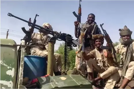  ?? AFP ?? Fighters belonging to a mobile unit of Sudan’s paramilita­ry Rapid Support Forces on patrol in East Nile state