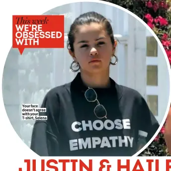  ??  ?? Your face doesn’t agree with your T-shirt, Selena