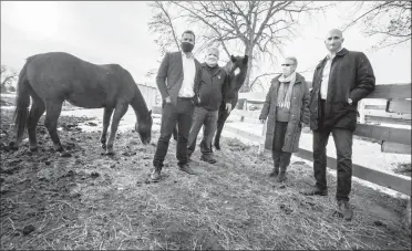  ?? Herald photo by Ian Martens ?? Dennis Chinner, along with Steve Mantrop and Wayne Meyers, and LTRA president Jo Hillman, were part of a $24,350 donation presented Monday to the Lethbridge Therapeuti­c Riding Associatio­n. @IMartensHe­rald