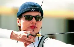  ??  ?? Actress Geena Davis in Sydney training for the Sydney Internatio­nal Golden Arrow Archery competitio­n; right singer-songwriter Sheryl Crow, while attending high school in Missouri, was an all-state track star and won a medal in the 75-metre hurdles.