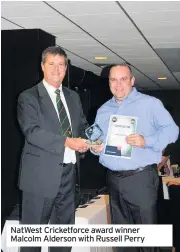  ??  ?? NatWest Cricketfor­ce award winner Malcolm Alderson with Russell Perry