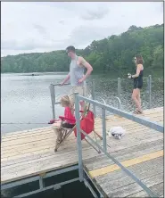  ?? (Special to NWA Democrat-Gazette/Sally Carroll) ?? Kylie, Brendon and Kristen Piper enjoy the weather and some fishing May 16 at Lake Norwood. The warm weather provided a great opportunit­y to spend some time together outdoors.