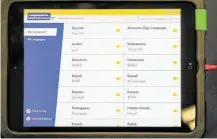  ?? Thomas B. Shea / Contributo­r ?? An iPad connects to interprete­rs who can assist in dozens of languages, including American Sign Language.