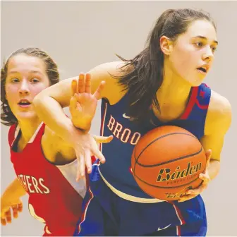  ?? GERRY KAHRMANN ?? Louise Forsyth, right, was a two-time all-star and part of three championsh­ip teams while playing for the Brookswood Bobcats. She is now a senior playing basketball at Gonzaga.