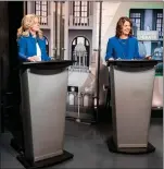  ?? CP PHOTO ?? NDP leader Rachel Notley and UCP leader Danielle Smith prepare for a debate earlier this week in Edmonton