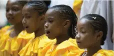  ??  ?? The choir teaches kids discipline and lets them travel, its co-founder says.