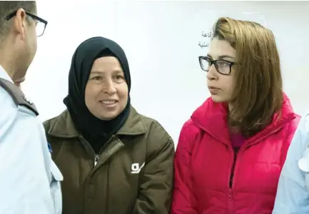  ??  ?? Nour Tamimi, right, with Ahed Tamimi’s mother Nariman Tamimi, left, in Ofer military court. (File photo)