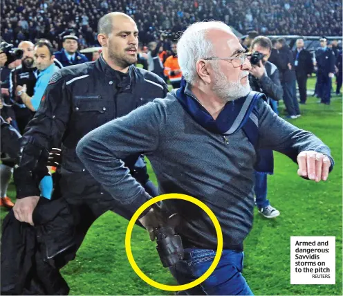  ?? REUTERS ?? Armed and dangerous: Savvidis storms on to the pitch