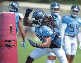  ?? GEORGE WALKER IV/TENNESSEAN ?? Jadeveon Clowney, seen during practice last season, is reportedly being pursued by the Cleveland Browns.
