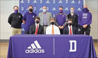  ?? Courtesy of Tannika King ?? Darlington football’s Harrison Allen, Brinson Sumner and Davis Watson are honored in a signing ceremony at Darlington School on National Signing Day. Back row (left to right): Coaches Patrick Collier, Kevin Hunt, Tommy Atha, Brent Bell, Donny Brown (trainer), Dean Ratledge. Front row (left to right): Davis Watson, Brinson Sumner, Harrison Allen.