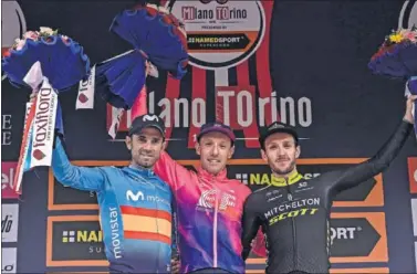  ??  ?? Alejandro Valverde, Michael Woods y Adam Yates posan en el podio de la Milán-Turín celebrada ayer.