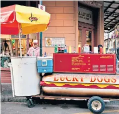  ?? ?? i Sausage machine: Lucky Dogs carts have been selling hotdogs in Louisiana since 1947 and were fictionali­sed as Paradise Vendors in John Kennedy Toole’s book