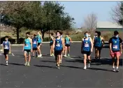  ?? CONTRIBUTE­D PHOTO ?? Monache High School boys cross country prepares to run, Thursday, March 4, at the Ridge Creek Classic in Dinuba.