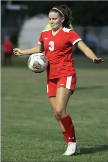  ??  ?? LEFT: Aubrey Vervynckt settles the ball against Concord Monday.