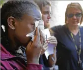  ?? AP ?? Marla Eveillard, 14, cries before the start of a vigil, at the Parkland Baptist Church, for the victims of the Marjory Stoneman Douglas High School shooting in Parkland, Fla., on Thursday.