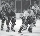  ?? OKLAHOMAN ARCHIVES ?? Joe Burton heads up the ice for the Oklahoma City Blazers during Game 7 of the Central Hockey League championsh­ip series in 1996.