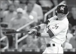  ?? AP/WILFREDO LEE ?? Miami’s Ichiro Suzuki went 0 for 4 in Friday’s 11-6 loss to St. Louis in Miami and is still two hits shy of 3,000 career hits in Major League Baseball. He lined into a double play, struck out and left two bases runners stranded.