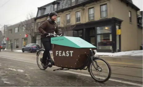  ?? LUCAS OLENIUK/TORONTO STAR FILE PHOTO ?? Feast was on the road last January, but the company’s delivery service in Toronto hasn’t made it to a second winter.