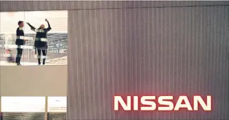  ?? EUGENE HOSHIKO THE ASSOCIATED PRESS FILE PHOTO ?? Renault owns about 43 per cent of Nissan, while Nissan owns 15 per cent of Renault through shares that lack voting rights.