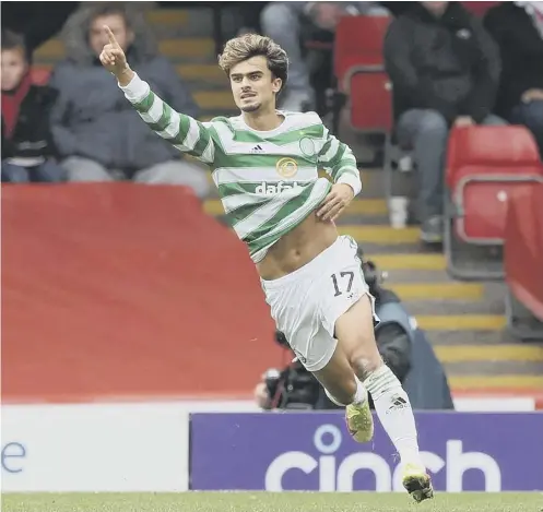  ?? ?? 0 Jota celebrates after netting the winner in Celtic's scrappy 2-1 success in Aberdeen