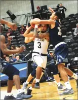  ?? Photo by Ernest A. Brown ?? After two lopsided defeats, Bryant earned a 7163 victory over St. Peter’s at the Chace Athletic Center Wednesday night.
