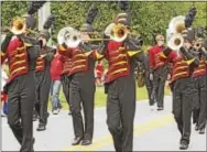  ?? CHRIS BARBER — DIGITAL FIRST MEDIA ?? The Avon Grove Band marches toward the school.