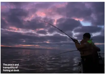  ??  ?? The peace and tranquilit­y of fishing at dusk