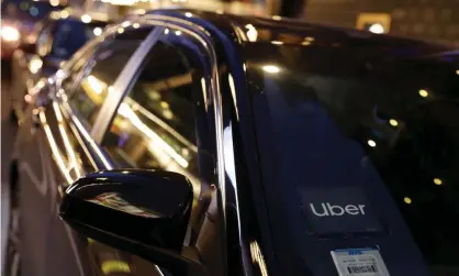  ?? Photograph: Andrew Kelly/Reuters ?? An Uber driver was mauled by a police dog during a traffic stop after the rental company reported his car as stolen when he had missed a few payments.