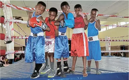  ?? Picture: FAITH QINGA ?? GLOVES ON: U11 boxers get ready before the start of Saturday’s boxing tournament at Jauka Hall. From left are Iminam Nyaba, Yonda Mabandla, Daliwonga Makhuluma, Oyintanda Mandara and Evethando September.