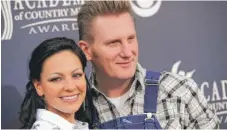  ??  ?? JoeyMartin Feek and husband Rory Lee Feek arrive at the 2011 Academy of Country Music Awards in Las Vegas.