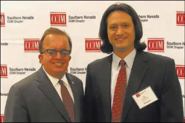  ?? Jeffrey Meehan Las Vegas Business Press ?? The 2018 Southern Nevada CCIM President Chris McGarey, left, stands with Joe Brezny of Carrara Nevada at the Westin Las Vegas. Brezny was the keynote speaker for CCIM’s June luncheon on recreation­al marijuana.