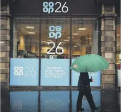  ?? ?? A Co-op store has been rebranded for COP26 in Glasgow