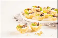  ??  ?? Fig and walnut yogurt tarts can be served as an appetizer or snack.