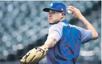  ??  ?? SIN FIRMAR. Los entrenamie­ntos iniciaron y aún no hay nada definido con relación al dominicano Manny Machado.