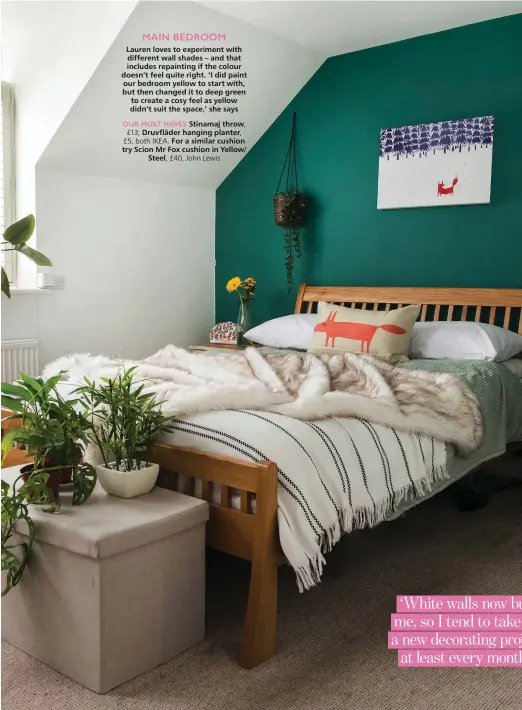  ??  ?? MAIN BEDROOM
Lauren loves to experiment with different wall shades – and that includes repainting if the colour doesn’t feel quite right. ‘I did paint our bedroom yellow to start with, but then changed it to deep green to create a cosy feel as yellow didn’t suit the space,’ she says
OUR MUST HAVES Stinamaj throw, £13; Druvfläder hanging planter, £5, both IKEA. For a similar cushion try Scion Mr Fox cushion in Yellow/
Steel, £40, John Lewis