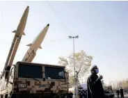  ?? ?? MISSILES displayed at Mosallah Mosque on the second anniversar­y of Iran’s missile attack at the US Ayn al-Asad military airbase in Iraq in Tehran earlier this year. Iran wants the US to lift its designatio­n of its Islamic Revolution­ary Guard Corps as terrorists.