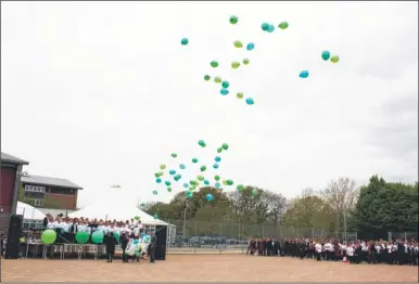  ??  ?? Balloons were release at Homewood School and Sixth Form Centre