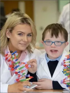  ??  ?? Jessica Connolly 3rd year Agricultur­e student from Co. Monaghan pictured with Patrick Cartright age 11 from St Oliver Plunkett’s during Fantastic DNA Cell Explorers Workshop as part of DkIT Science Week.