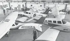  ?? MALCOLM DENEMARK, FLORIDA TODAY VIA USA TODAY NETWORK ?? Space Coast Aviation and Airborne Systems at Merritt Island airport fills its hangar Friday morning.