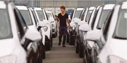  ?? REUTERS PIC ?? General Motors Co will close one of its four plants in South Korea and decide the future of its remaining South Korean operations within weeks.