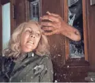  ?? PHOTOS BY RYAN GREEN/UNIVERSAL ?? Laurie Strode (Jamie Lee Curtis) has prepared for years for the return of tormentor Michael Myers (James Jude Courtney), who is back in Haddonfiel­d, Ill., looking to settle some scores.
