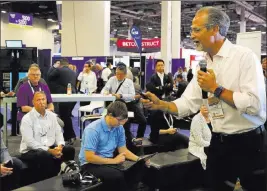  ??  ?? Robert Rippee, who leads the Hospitalit­y Lab at UNLV’S Internatio­nal Gaming Institute, speaks Thursday during Global Gaming Expo at the Sands Expo and Convention Center.